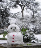 Snowman with petal buttons.